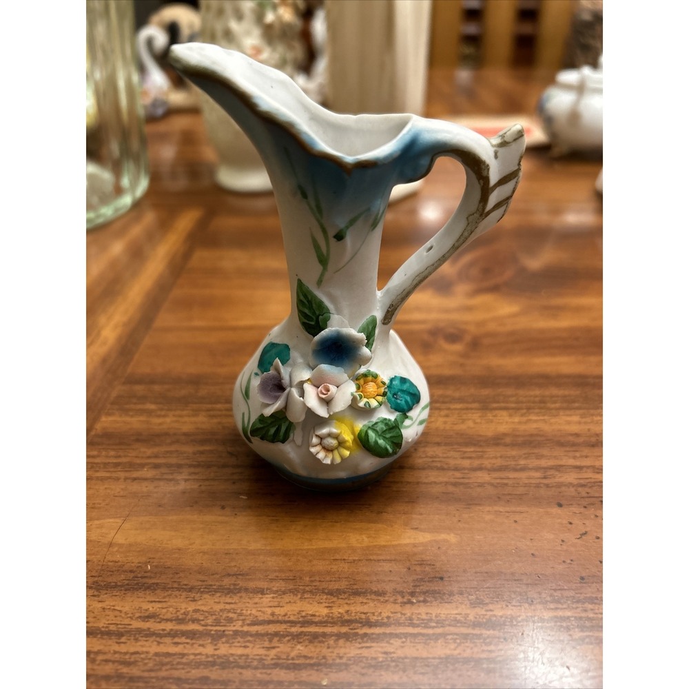 Small Bisque Porcelain Pitcher Raised Flowers Blue Hand painted